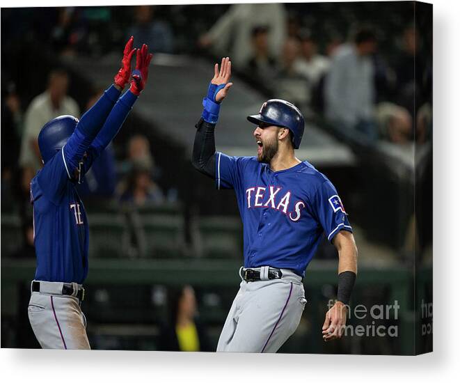 Three Quarter Length Canvas Print featuring the photograph Texas Rangers V Seattle Mariners by Stephen Brashear