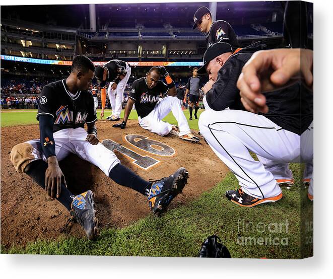 People Canvas Print featuring the photograph New York Mets V Miami Marlins by Rob Foldy