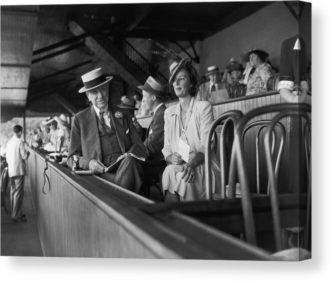Straw Hat Canvas Print featuring the photograph A Day At The Track by Bert Morgan
