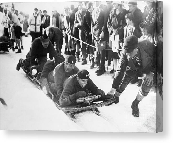 Young Men Canvas Print featuring the photograph American Bobsled Team Wins In Olympics by Bettmann