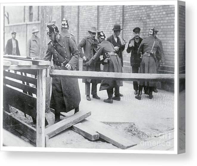 Following Canvas Print featuring the photograph German Police Checking Communist by Bettmann