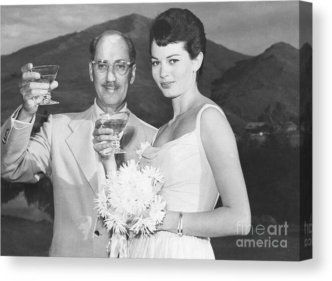 Bridegroom Canvas Print featuring the photograph Groucho Marx Toastswbride Eden Hartford by Bettmann