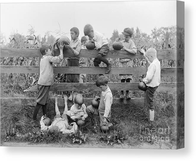 Tranquility Canvas Print featuring the photograph Group Of Children 4-12 Years By Fence by Bettmann