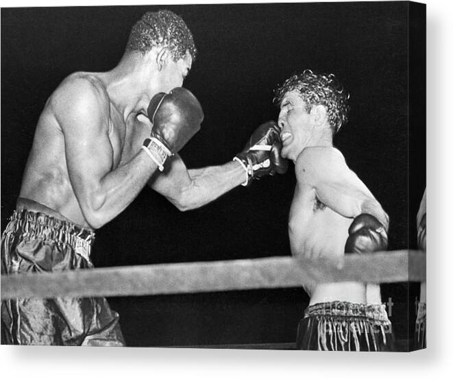 People Canvas Print featuring the photograph Joe Louis Boxing With Billy Conn by Bettmann