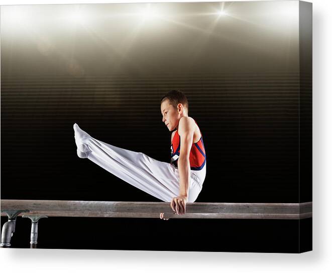 Focus Canvas Print featuring the photograph Young Male Gymnast Performing On by Robert Decelis Ltd