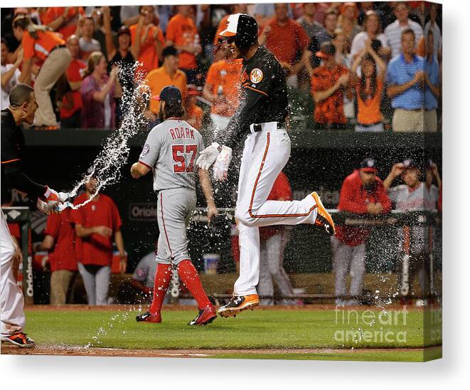 Ninth Inning Canvas Print featuring the photograph Manny Machado and Jonathan Schoop by Rob Carr