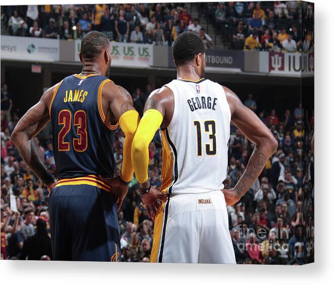 Playoffs Canvas Print featuring the photograph Paul George and Lebron James by Ron Hoskins