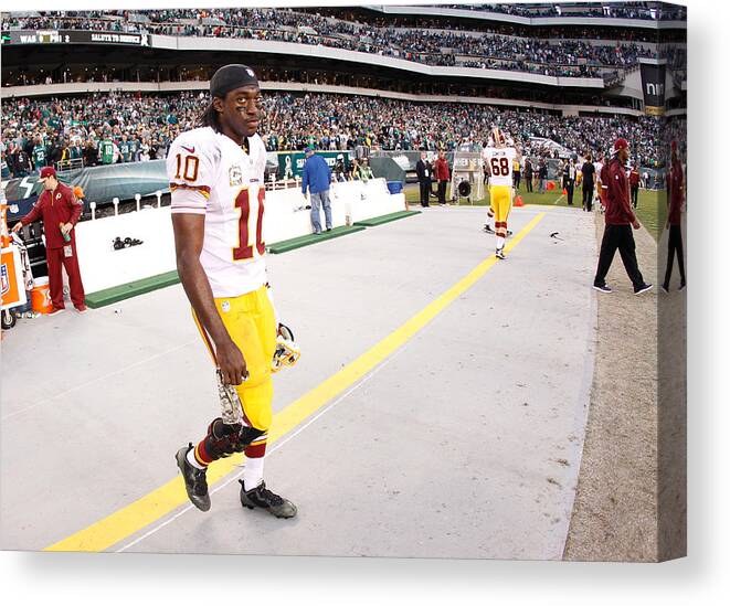 Following Canvas Print featuring the photograph Washington Redskins v Philadelphia Eagles #14 by Rob Carr