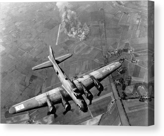 B 17 Bomber Canvas Print featuring the photograph B-17 Bomber Over Germany - WW2 - 1943 by War Is Hell Store