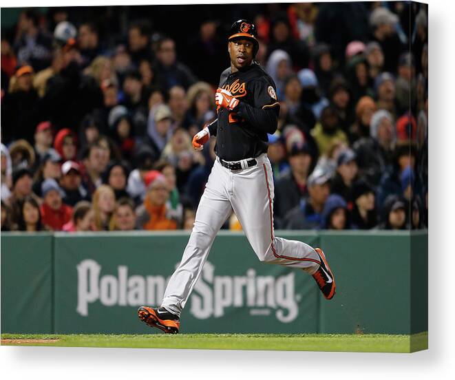 American League Baseball Canvas Print featuring the photograph Delmon Young and Matt Wieters by Jim Rogash