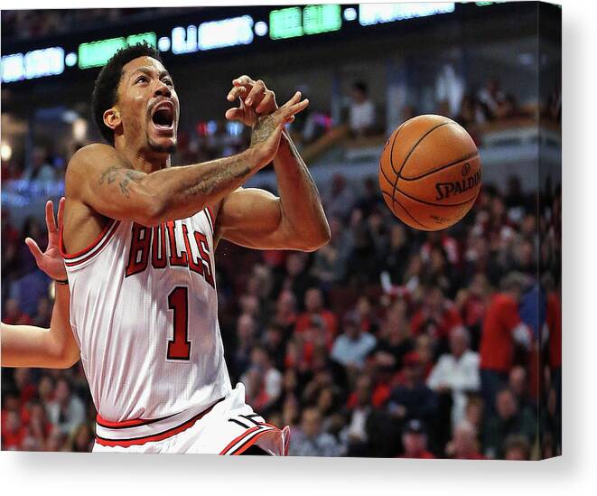 Chicago Bulls Canvas Print featuring the photograph Derrick Rose and Michael Carter-williams by Jonathan Daniel