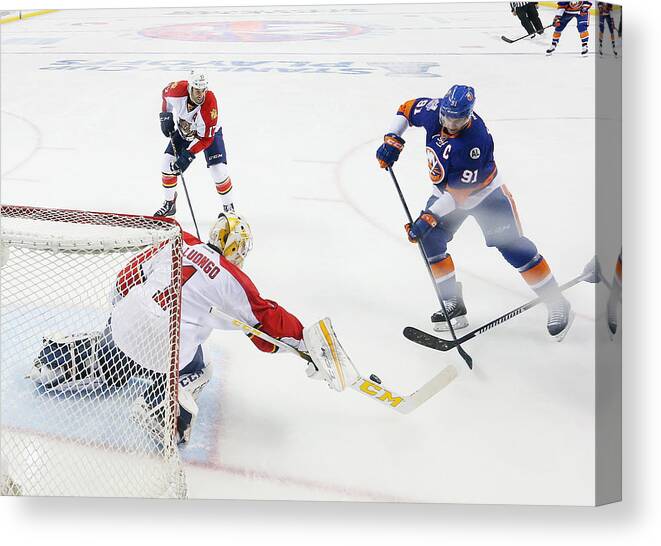 Playoffs Canvas Print featuring the photograph Florida Panthers v New York Islanders - Game Three by Bruce Bennett