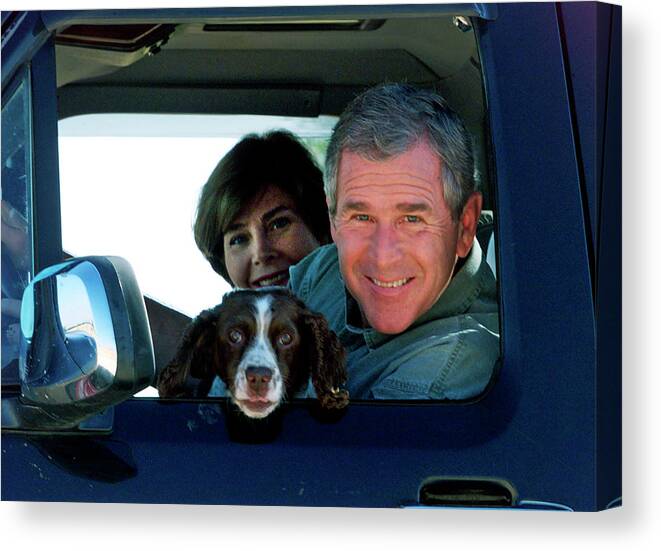 George W. Bush Canvas Print featuring the photograph George Bush and Laura in Truck by Rick Wilking