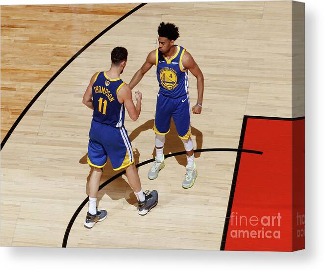 Playoffs Canvas Print featuring the photograph Klay Thompson and Jonas Jerebko by Mark Blinch