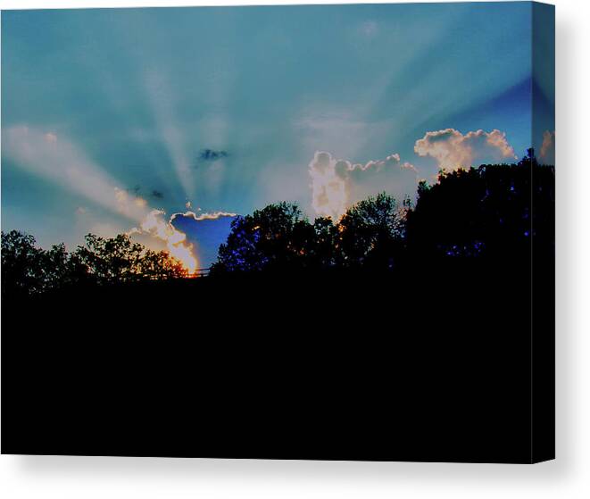 Sunset Canvas Print featuring the photograph Streaming Sunset by Christopher Reed
