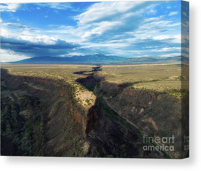Taos Canvas Print featuring the photograph The Land before Time by Elijah Rael