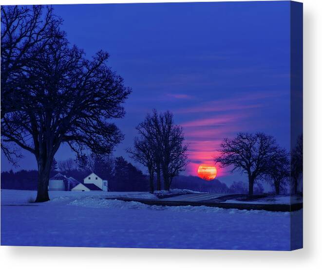 Moonrise Canvas Print featuring the photograph Wisconsin Snow Moon - Winter moonrise over farm by Peter Herman