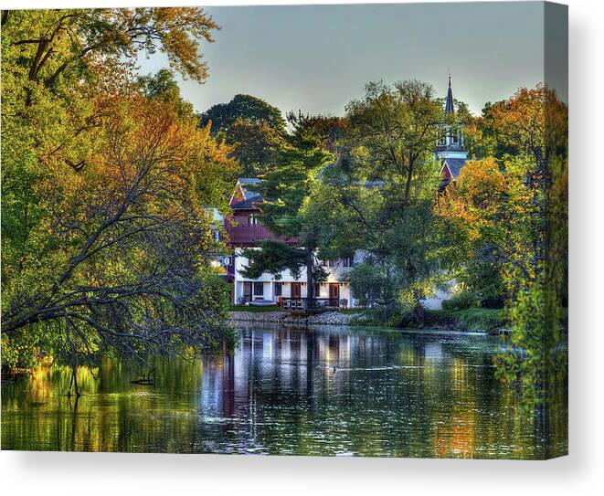 Yahara River Stoughton Wi Downtown Church Sunset Golden Autumn Fall Tranquil Canvas Print featuring the photograph Yahara River in Stoughton WI by Peter Herman