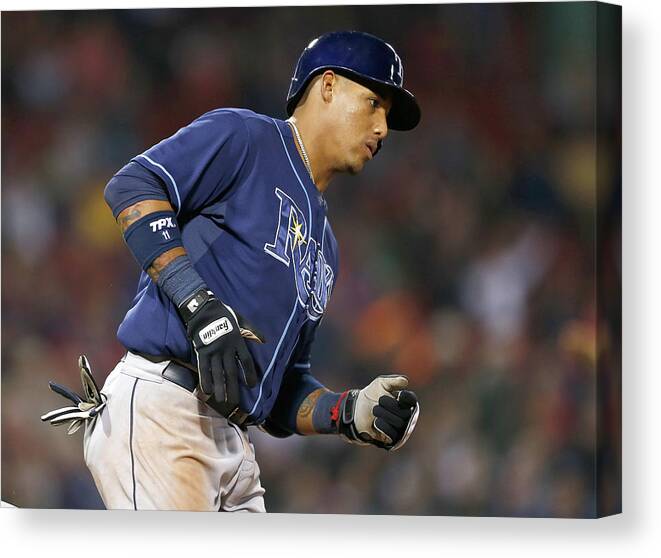 Game Two Canvas Print featuring the photograph Yunel Escobar by Jim Rogash