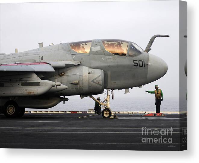 Military Canvas Print featuring the photograph An Ea-6b Prowler Prepares To Launch #1 by Stocktrek Images