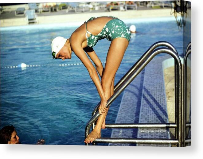 Fashion Canvas Print featuring the photograph Model Wearing A Mirella Swimsuit #1 by Arthur Elgort