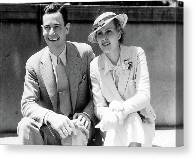 Photography Canvas Print featuring the photograph 1930s Smiling Couple Sitting Outdoors by Vintage Images