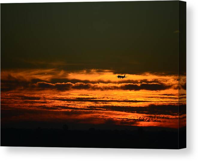 Airplane Canvas Print featuring the photograph Arriving by Ronda Broatch
