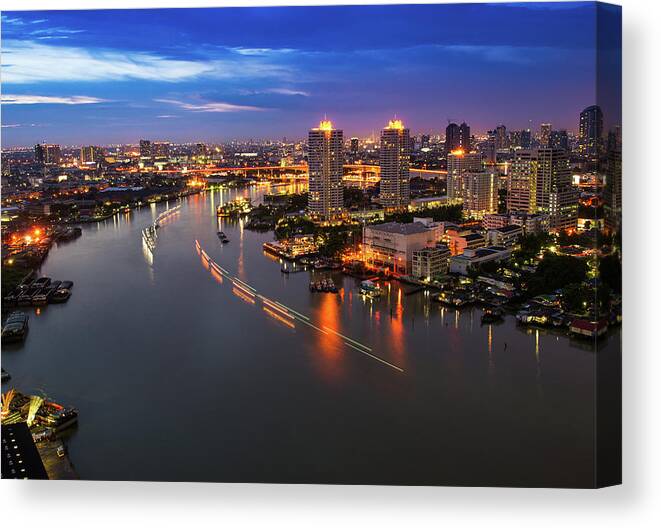 Outdoors Canvas Print featuring the photograph Bangkok City And River During Sunset by Naphakm