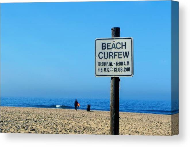 Ocean Canvas Print featuring the photograph Beach curfew by Tammy Espino