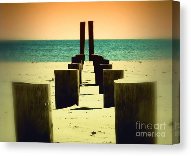 Pylon Canvas Print featuring the photograph Beach Pylons by Sharon Woerner