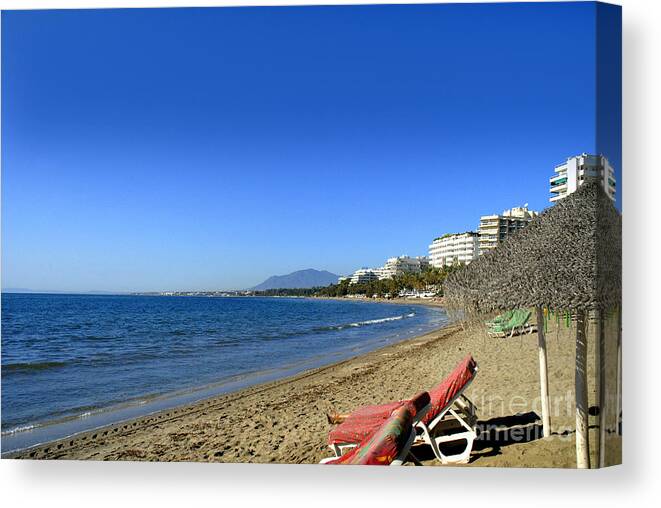 Sunset Canvas Print featuring the photograph Empty beach at Marbella by Brenda Kean