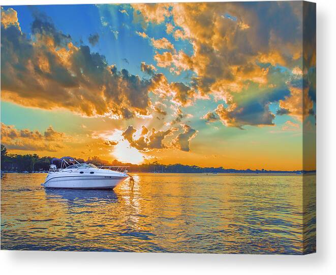 Sunset Canvas Print featuring the photograph Fiery Sunset On Lake Minnetonka by Bill and Linda Tiepelman