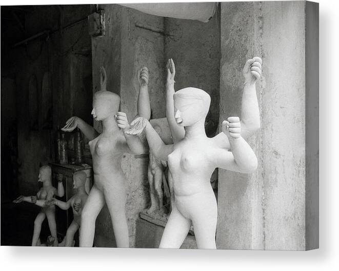 Surreal Canvas Print featuring the photograph Hindu Idols In Calcutta by Shaun Higson