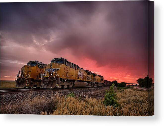 Train Canvas Print featuring the photograph In Waiting by Thomas Zimmerman