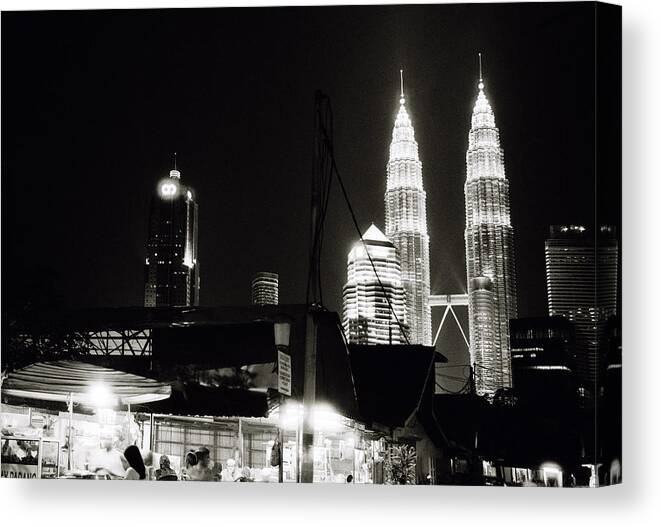 Petronas Towers Canvas Print featuring the photograph Night in Kampung Baru by Shaun Higson