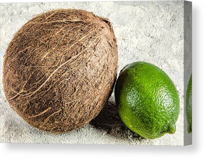 Lime In The Coconut Canvas Print featuring the photograph Lime in the coconut by John Crothers