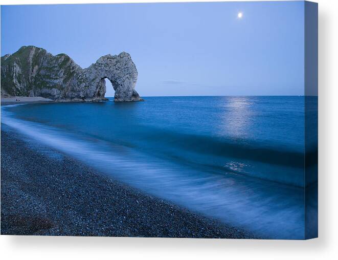 Durdle Canvas Print featuring the photograph Moonlit bay by Ian Middleton