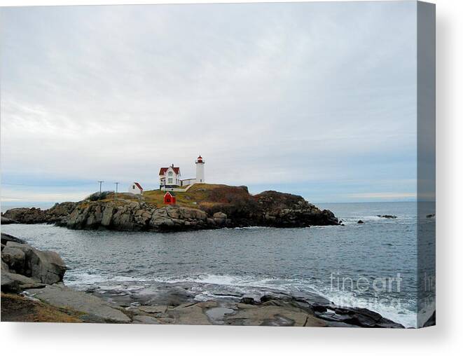 Nubble Lighthouse Canvas Print featuring the photograph Nubble Lighthouse In Early Winter by Eunice Miller
