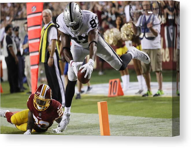 People Canvas Print featuring the photograph Oakland Raiders v Washington Redskins by Rob Carr