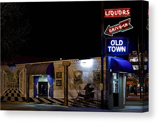 Old Canvas Print featuring the photograph Old Town Liquors by Chas Andrews