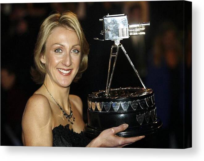 Bbc Television Centre Canvas Print featuring the photograph Paula Radcliffe poses with the BBC sports personality of the year award by Warren Little