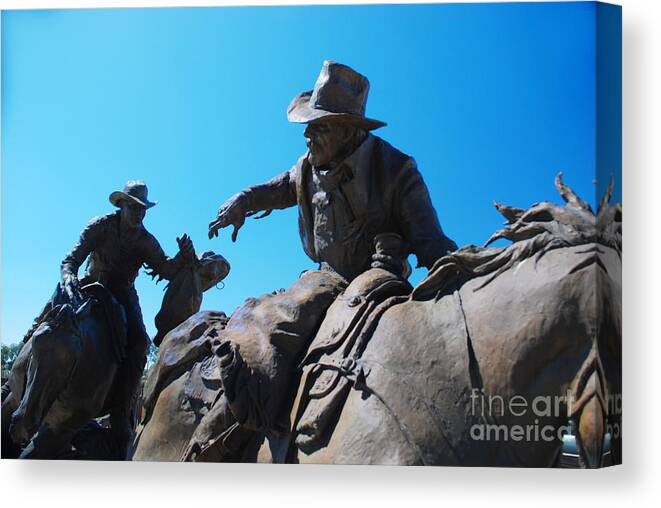 Pony Express Sculpture Horse Horses Cowboy Cowboys Courier Mail Bag Wild West Scottsdale Arizona Bronze Herb Mignery Passing The Legacy Canvas Print featuring the photograph Pony Express by Richard Gibb