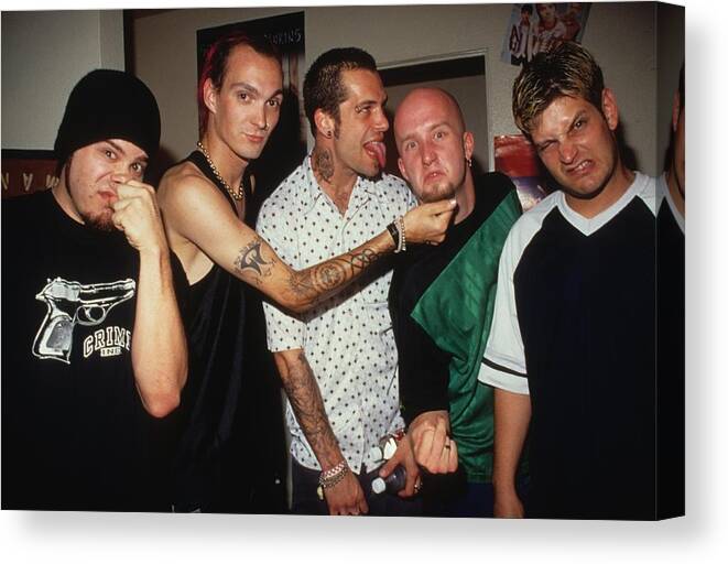 Music Canvas Print featuring the photograph Punk Band Snot Poses For A Portrait by Jim Steinfeldt