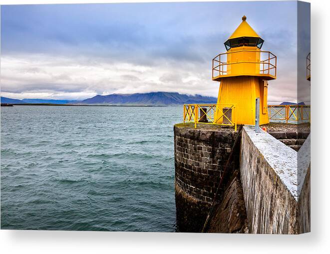 Europe Canvas Print featuring the photograph Reykjavik harbor lighthouse by Alexey Stiop