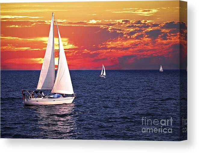 Boat Canvas Print featuring the photograph Sailboats at sunset by Elena Elisseeva