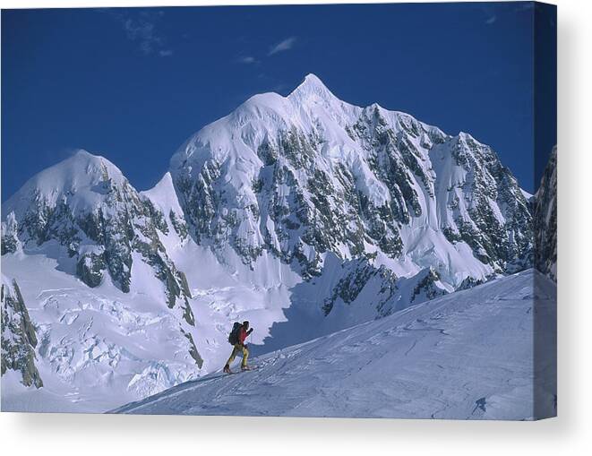 Feb0514 Canvas Print featuring the photograph Skiier Nearing Von Bulow Peak New by Colin Monteath