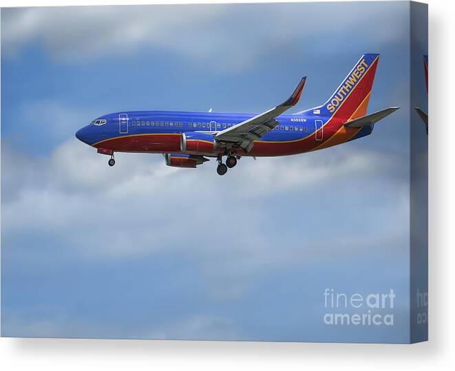 Southwest Airlines Jet Canvas Print featuring the photograph Southwest Airlines Jet by D Wallace