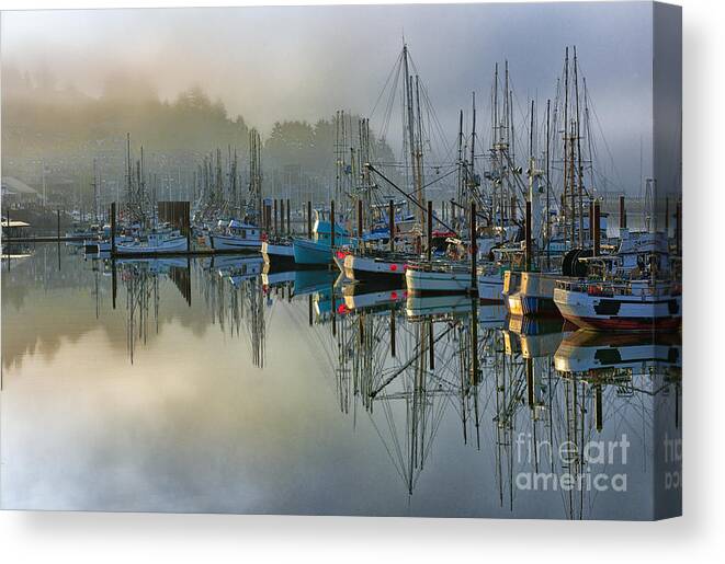 Harbor;sunrise;boats;fog;mist;clouds;reflection;reflections;harbors;newport;oregon;pacific;northwest;scenic;scenics;fishing;waterscape;waterscapes;sandra Bronstein;mirror;colorful;horizontal;morning;moody;fine;art;photography;canvas;prints;posters;greeting;cards;notecards;iconic;tourism;travel;port;seaport;acrylic;photographs; Canvas Print featuring the photograph Sunrise At Newport Harbor by Sandra Bronstein