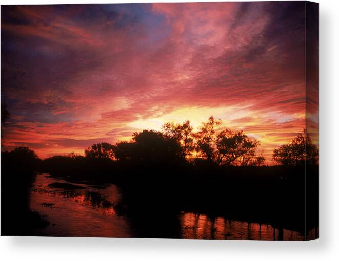Astronomy Canvas Print featuring the photograph Sunrise by Dan Guravich
