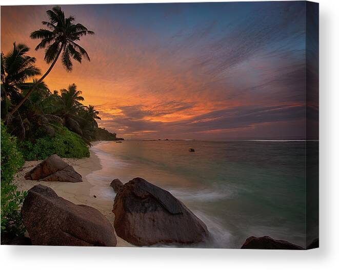 Water's Edge Canvas Print featuring the photograph Sunset Colors On A Paradise Beach by Pitgreenwood